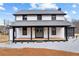 Stunning two-story home with a covered porch and meticulous landscaping at 260 Sandy Lake Cir, Fayetteville, GA 30214