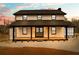 Charming two-story home with a covered front porch and stylish curb appeal at 260 Sandy Lake Cir, Fayetteville, GA 30214