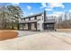 Charming two-story home with a covered porch and a well-manicured lawn at 260 Sandy Lake Cir, Fayetteville, GA 30214