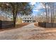 Beautiful two-story home with a long driveway and well-maintained landscaping at 260 Sandy Lake Cir, Fayetteville, GA 30214