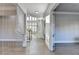 Bright foyer with hardwood floors and staircase at 3540 Paddocks Pkwy, Suwanee, GA 30024