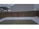 Backyard with a wooden fence and patio at 2087 Belmont Cir, Conyers, GA 30012