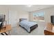Comfortable bedroom with neutral walls, carpet, and a window, creating a bright and welcoming space for rest and relaxation at 403 Sonja Ln, Loganville, GA 30052