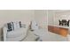 Comfortable living room featuring neutral tones and views to the dining area at 403 Sonja Ln, Loganville, GA 30052