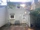 This backyard features a small patio and neutral siding at 6104 Cobblestone Ct, Douglasville, GA 30134