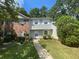 Charming townhome featuring a well-manicured front lawn and inviting walkway at 6104 Cobblestone Ct, Douglasville, GA 30134