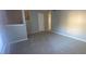 Spacious living room with new carpeting and fresh paint throughout at 6104 Cobblestone Ct, Douglasville, GA 30134