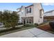 Charming two-story home with stone accents, landscaped yard, and well-maintained lawn and inviting curb appeal at 921 Ambient Sw Way, Atlanta, GA 30331