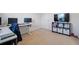 Spacious home office area with plush carpet and built-in storage solutions at 921 Ambient Sw Way, Atlanta, GA 30331