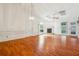 Bright and airy living room with a fireplace and hardwood floors at 135 Wilbanks Dr, Fayetteville, GA 30215