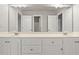 Bright bathroom boasts a double sink vanity at 1859 Mapmaker Dr, Dacula, GA 30019