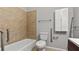 Bathroom featuring bathtub, toilet, towel rack, and vanity cabinet at 1859 Mapmaker Dr, Dacula, GA 30019