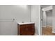 Bathroom featuring wooden vanity cabinet and sink at 1859 Mapmaker Dr, Dacula, GA 30019
