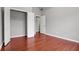Bright bedroom with wood floors and closet at 1859 Mapmaker Dr, Dacula, GA 30019