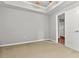 Bedroom featuring neutral carpet, walls, and trim at 1859 Mapmaker Dr, Dacula, GA 30019
