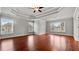 Large main bedroom with hardwood floors, decorative ceiling, and plenty of natural light at 1859 Mapmaker Dr, Dacula, GA 30019