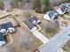 Aerial view of a single-Gathering home showing the roof, driveway, and surrounding neighborhood at 4477 James Wade Dr, Snellville, GA 30039