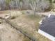 Aerial shot of a fenced backyard and patio, perfect for outdoor activities and relaxation at 4477 James Wade Dr, Snellville, GA 30039