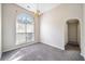 Spacious living room with a large window for natural light at 4477 James Wade Dr, Snellville, GA 30039