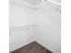 An empty walk-in closet with carpet and white wire shelving at 4477 James Wade Dr, Snellville, GA 30039