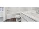 Bathroom shows shower-tub, toilet, and vanity with white countertops at 1705 Trout Lily Pl, Smyrna, GA 30126