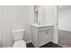 Bathroom features a modern gray vanity and a toilet at 1705 Trout Lily Pl, Smyrna, GA 30126