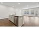 Kitchen island with stainless steel dishwasher at 1705 Trout Lily Pl, Smyrna, GA 30126