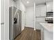 Kitchen with stainless steel appliances and hardwood floors at 1705 Trout Lily Pl, Smyrna, GA 30126