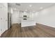 Bright kitchen featuring stainless steel appliances, a center island, and modern lighting at 1705 Trout Lily Pl, Smyrna, GA 30126