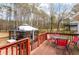 Deck with patio furniture and a gazebo, all overlooking a woodland view at 3521 Stone Ridge Dr, Douglasville, GA 30134