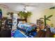 bedroom with forest mural and blue character bedding at 3521 Stone Ridge Dr, Douglasville, GA 30134