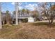 A well-maintained home with an attached two-car garage, nice front porch, and manicured landscaping at 3521 Stone Ridge Dr, Douglasville, GA 30134