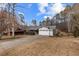 Charming single-story house with an attached two-car garage and a long driveway at 3521 Stone Ridge Dr, Douglasville, GA 30134