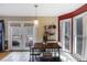 Cozy kitchen featuring a dining nook with natural light and white cabinets at 3521 Stone Ridge Dr, Douglasville, GA 30134