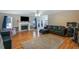 Bright living room featuring a fireplace and access to the back deck at 3521 Stone Ridge Dr, Douglasville, GA 30134
