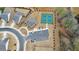 Aerial view featuring a community tennis court, parking, and well-maintained green spaces at 124 Redford Ln, Canton, GA 30115