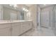 Modern bathroom with dual sinks, ample countertop space, and marble floors at 124 Redford Ln, Canton, GA 30115