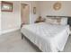 Bright bedroom with a queen-sized bed, soft carpeting, and natural light from the window at 124 Redford Ln, Canton, GA 30115