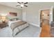 Cozy bedroom showcasing a neutral color palette, comfortable carpet, and ample natural light at 124 Redford Ln, Canton, GA 30115