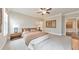 Large bedroom featuring ceiling fan, neutral walls and plush carpet at 124 Redford Ln, Canton, GA 30115