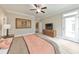 Brightly lit bedroom with neutral walls, ceiling fan, and a cozy vibe at 124 Redford Ln, Canton, GA 30115