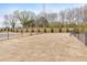 Fenced dog park featuring grass and seating at 124 Redford Ln, Canton, GA 30115