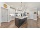 Modern kitchen featuring large island, stainless appliances, and open layout for entertaining at 124 Redford Ln, Canton, GA 30115