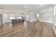 Spacious open-concept featuring the living, dining and kitchen areas with abundant light at 124 Redford Ln, Canton, GA 30115