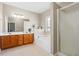 Spacious bathroom with double vanity, soaking tub, and separate shower at 1656 Maes Overlook, Loganville, GA 30052