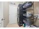 The laundry room features ample storage and a modern washer and dryer at 1656 Maes Overlook, Loganville, GA 30052