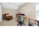 Bright office area with multiple work surfaces and natural light at 1656 Maes Overlook, Loganville, GA 30052