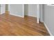 Hardwood bedroom featuring doorway, open closet and a bright window at 3783 Brookcrest Cir, Decatur, GA 30032