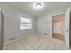 Cozy room with light walls, tile floor and large window at 3783 Brookcrest Cir, Decatur, GA 30032