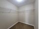 Walk-in closet featuring wire shelving for optimal storage solutions at 916 Hunt Rd, Jonesboro, GA 30236